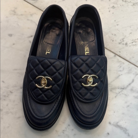 CHANEL Black Quilted Leather Loafers with Gold Accents - Picture 1 of 6